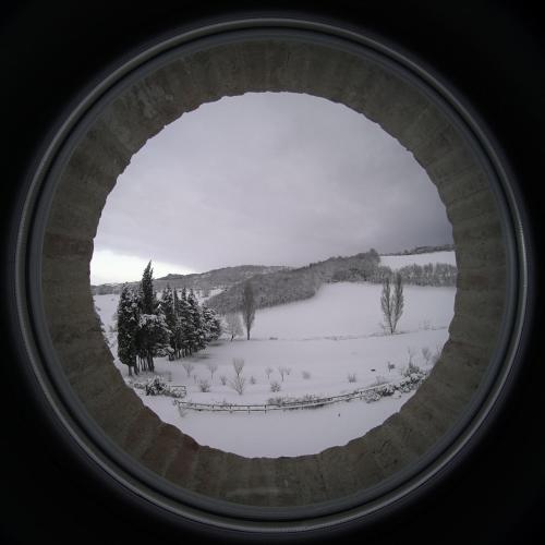a black and white picture of a snow covered field at Agriturismo Colle Casini Cortesi in Caldarola