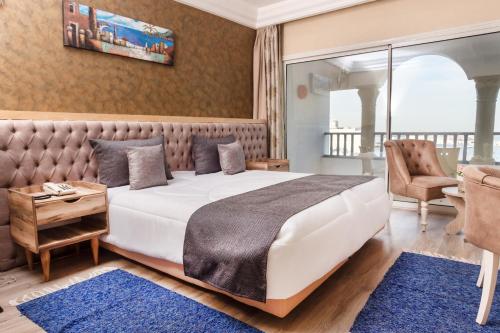 Voodi või voodid majutusasutuse Hotel El Habib Monastir toas