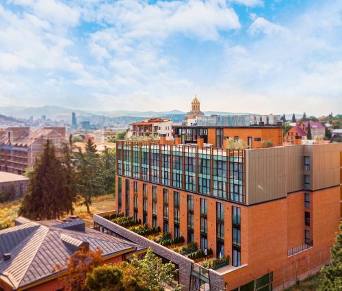 an office building with a view of the city at Ramada by Wyndham Tbilisi Old City in Tbilisi City