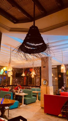 Hôtel Restaurant Aliにあるシーティングエリア
