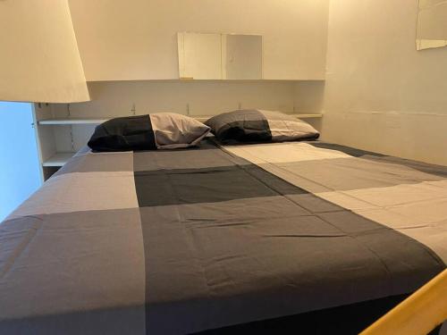 מיטה או מיטות בחדר ב-Le studio mezzanine