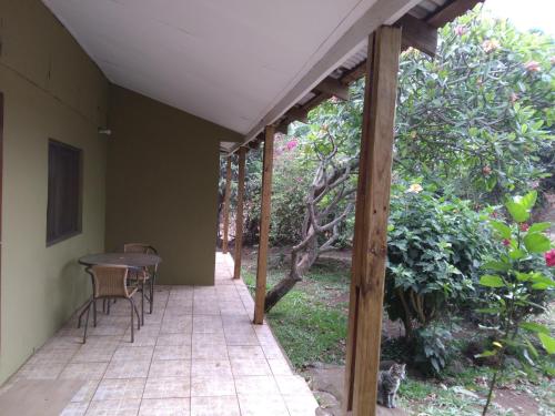 a patio with a table and chairs on it at Hare o Ahani in Hanga Roa