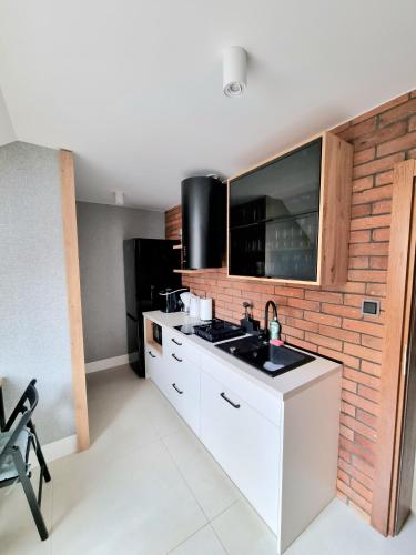 Dapur atau dapur kecil di Willa Baja