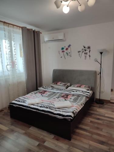 Postel nebo postele na pokoji v ubytování APARTAMENT HD ELI