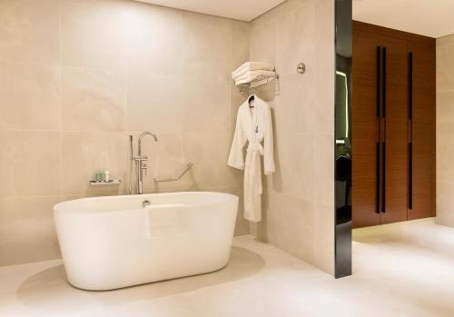 Koupelna v ubytování Asiana Grand Hotel