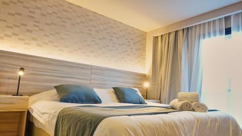 Ferrol Apart Hotelにあるベッド