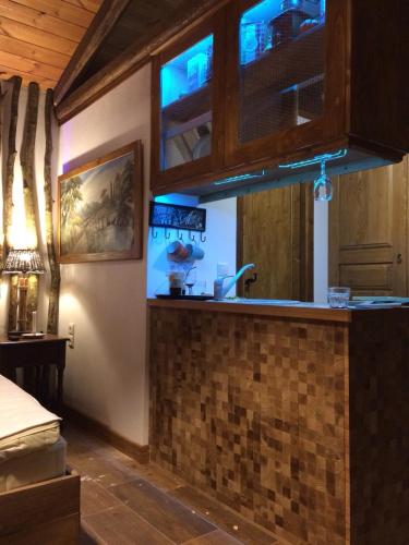 a kitchen with a sink and a counter top at Μαγεμένο Βουνό in Karpenision