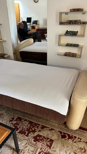 Letto o letti in una camera di Old Town Apartments