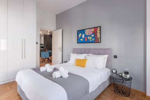 Posteľ alebo postele v izbe v ubytovaní The HostMaster Artistic Inn