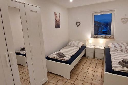 Postel nebo postele na pokoji v ubytování Ferien-/Monteurwohnung im Odw.