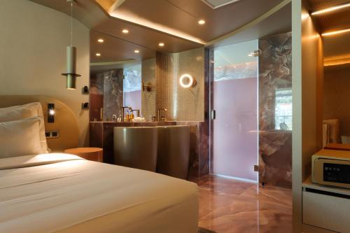 Кровать или кровати в номере The Views Baia - Adults Only