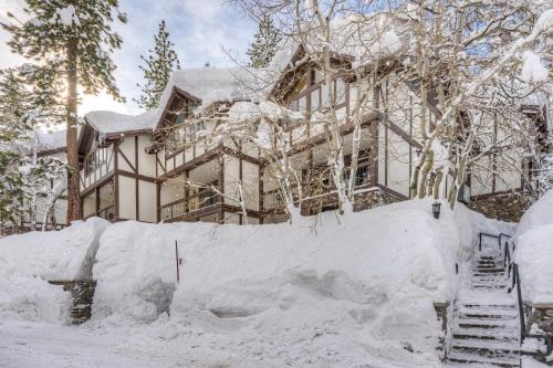 a house is covered in snow at Tavern Inn #15 in Olympic Valley