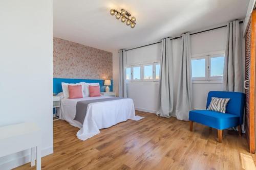 A bed or beds in a room at Apartamento con terraza en Barrio de Salamanca