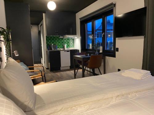 Ένα ή περισσότερα κρεβάτια σε δωμάτιο στο Magnolia House Sollentuna