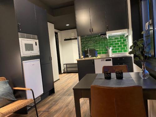 Η κουζίνα ή μικρή κουζίνα στο Magnolia House Sollentuna
