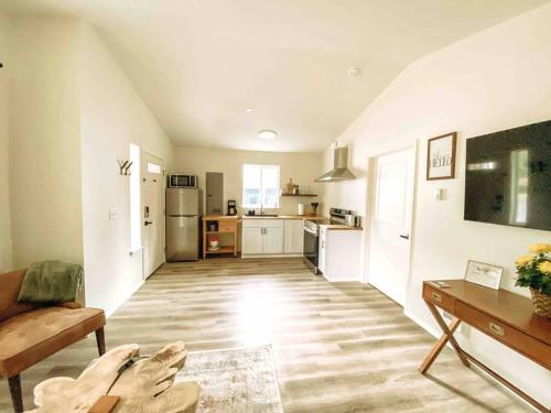 a room with a kitchen and a living room at Si View in North Bend