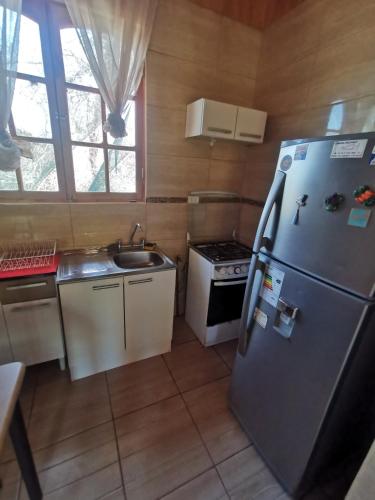 Η κουζίνα ή μικρή κουζίνα στο Hospedaje Atitur