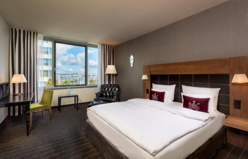 Krevet ili kreveti u jedinici u objektu Mövenpick Hotel Stuttgart Airport