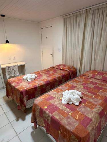 Кровать или кровати в номере Hotel Pousada Villa Marina