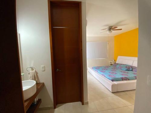 Vonios kambarys apgyvendinimo įstaigoje Alojamiento completo y muy confortable con servicio de alberca