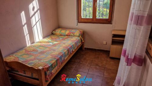 Llit o llits en una habitació de Mansion IBIZA Salou