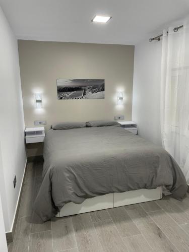 Postel nebo postele na pokoji v ubytování Apartamento Angeles