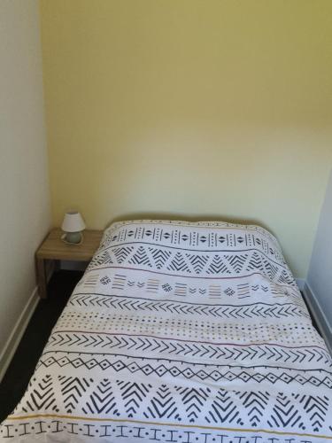 Posteľ alebo postele v izbe v ubytovaní Petite maison cocooning