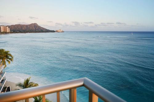 a view of the ocean from a balcony at OUTRIGGER Reef Waikiki Beach Resort in Honolulu