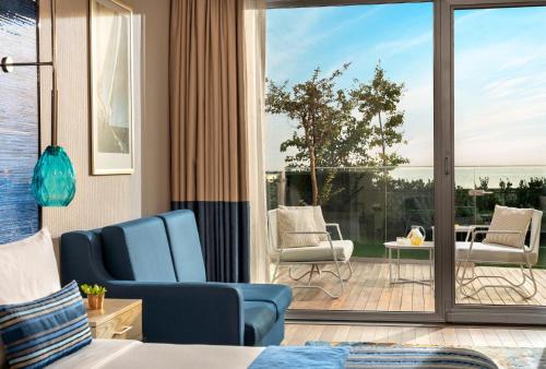 Junior King Suite with Terrace and Side Sea View