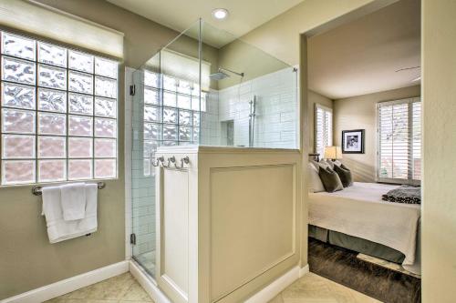 a bathroom with a shower and a bed in a room at Pet-Friendly Scottsdale Vacation Home with Patio in Scottsdale