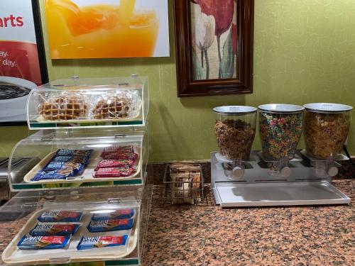 a display of food and drinks on a counter at Econo Lodge Huntington - Barboursville University Area in Huntington