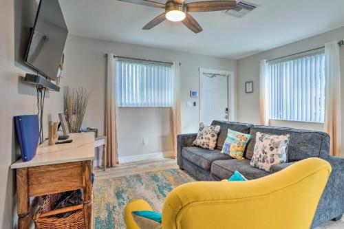 a living room with a couch and a ceiling fan at Gated Southern Miami Home 22 Mi to Downtown! in Miami