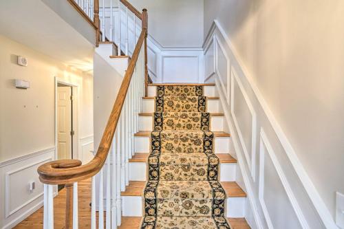 a staircase with white railings and a wooden stair case at Pet-Friendly Beacon Area Vacation Rental 6 Acres in Lagrangeville