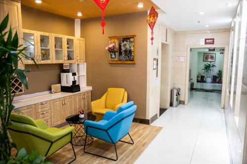 Kuchyň nebo kuchyňský kout v ubytování Meiyuan Hotel