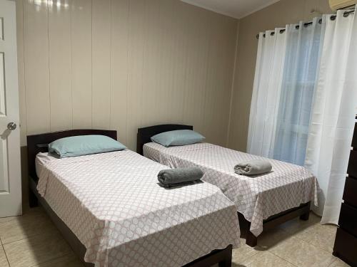 Ένα ή περισσότερα κρεβάτια σε δωμάτιο στο Casa Armadillo