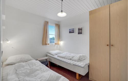 Postel nebo postele na pokoji v ubytování Agger Havn Feriecenter