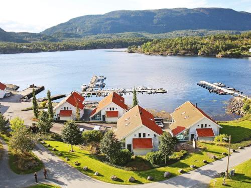 an aerial view of a house on the shore of a lake at Five-Bedroom Holiday home in Jelsa 2 in Jelsa