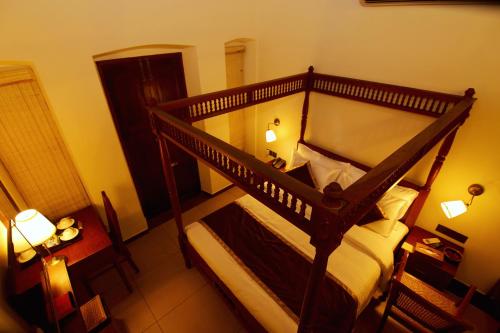 an overhead view of a bunk bed in a room at THE HILLWAY HERITAGE in Trivandrum