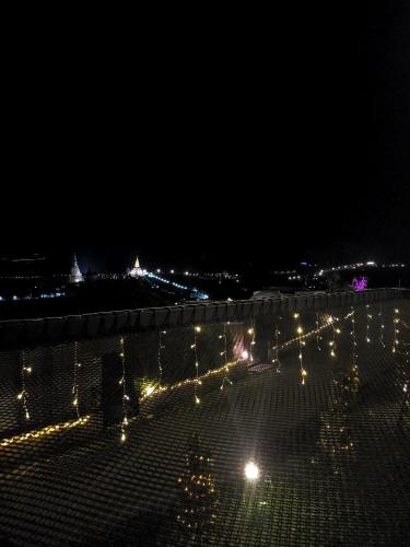a view of a city at night with lights at Chill & View ชิววิว เขาค้อ in Ban Huai Phai