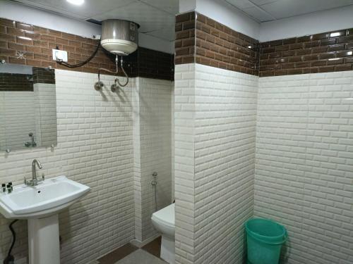 Koupelna v ubytování Hotel Kanishkka Inn