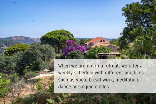 a sign that says when we are not in a retreat we offer a weekly schedule at Wild Oasis - Algarve in Monchique