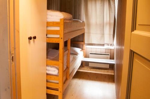 Двухъярусная кровать или двухъярусные кровати в номере 14-Nasjonalpark, sykling, fisking, kanopadling, skogs- og fjellturer