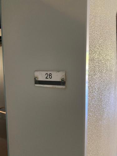 a door with a speed limit sign on it at Hannover Flughafen in Hannover