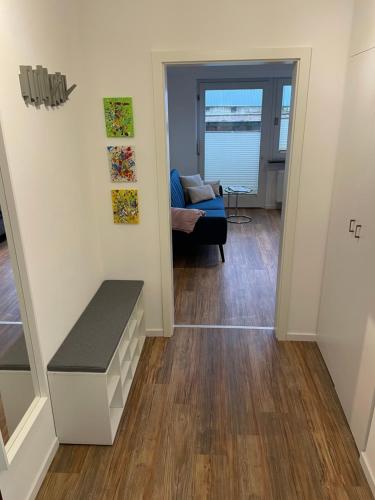a living room with a couch and a table at Saarland Appartements in Wadgassen