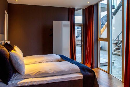 Nordis Apartments - Torget 21にあるベッド