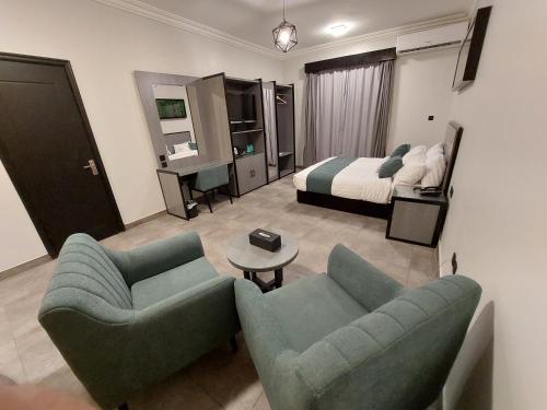 Ένα ή περισσότερα κρεβάτια σε δωμάτιο στο Karims Hotel