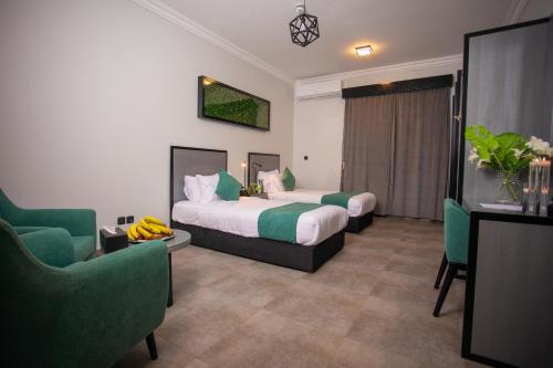 Voodi või voodid majutusasutuse Karims Hotel toas