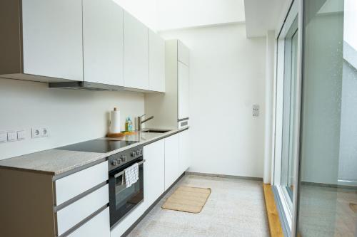 Una cocina o cocineta en Vienna City Apartments Belvedere