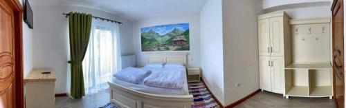 Cama o camas de una habitación en Rustica Complex Borsa