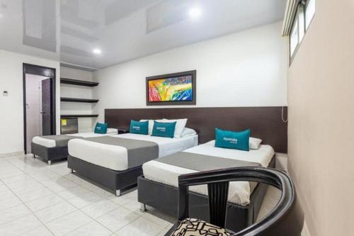 Postel nebo postele na pokoji v ubytování Hotel Ancor